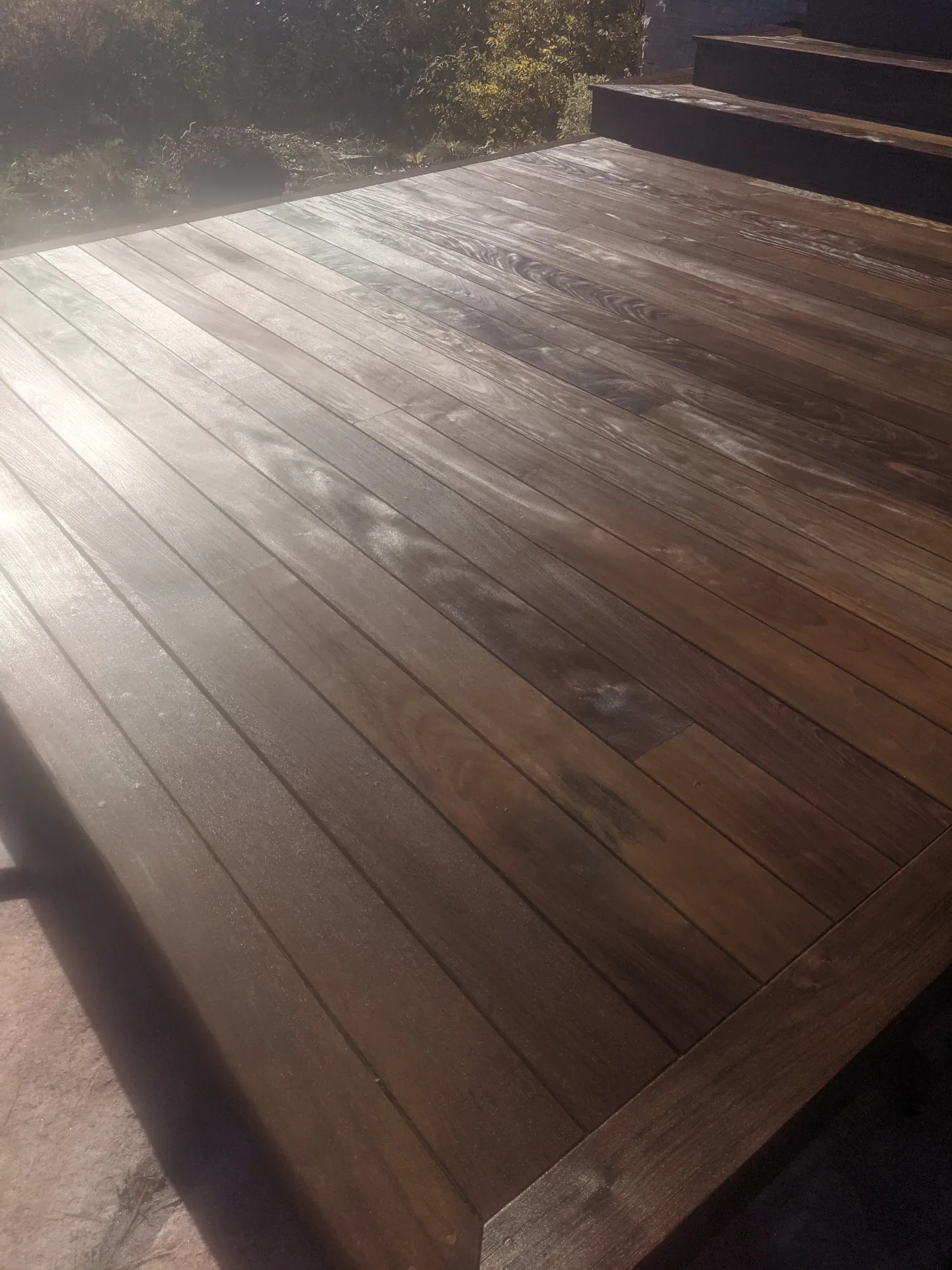 Hardwood deck staining finished result on a Muskoka cottage